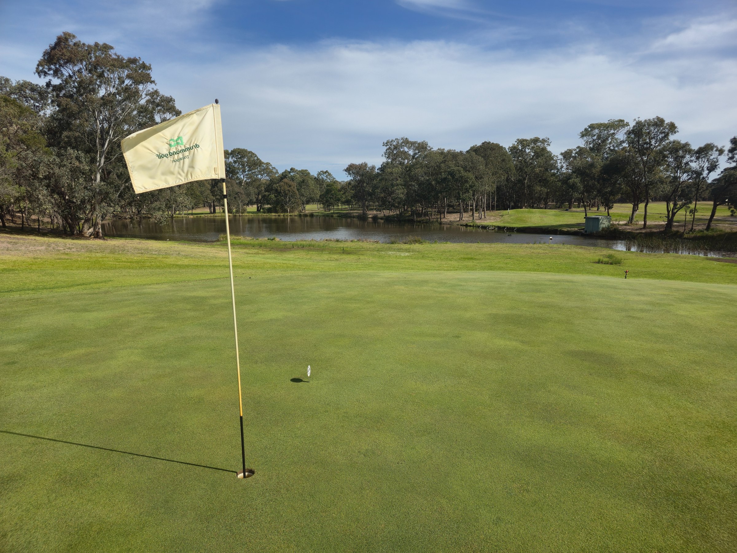 The 18th green at Heyfield Golf Club, looking back across the water